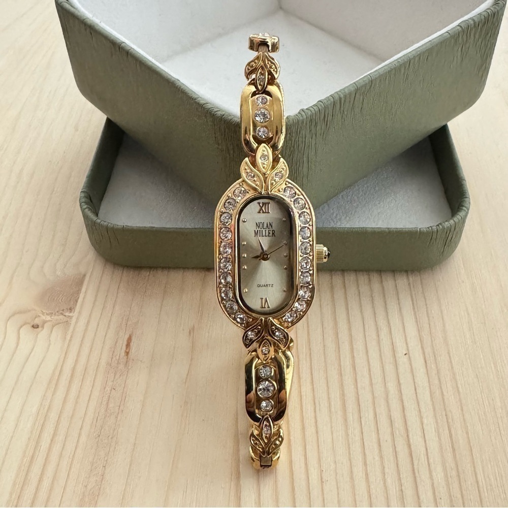 Nolan Miller Gold Toned Crystals Women’s Watch